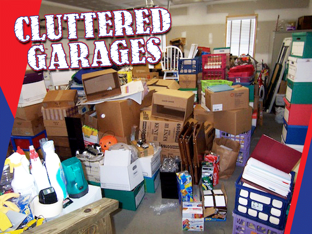 Cluttered garage filled with boxes, storage bins, and miscellaneous household items.